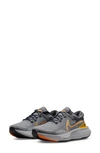 Nike Zoomx Invincible Run Flyknit Running Shoe In Iron Grey/ Kumquat/ Grey