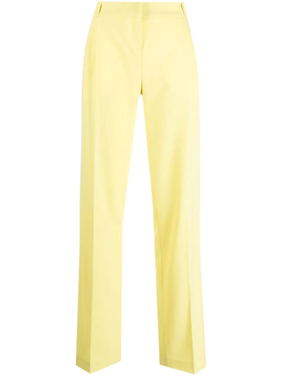 Coperni Pressed Twill Trousers In Yellow