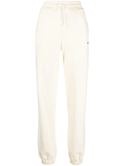 Msgm Logo Print Track Pants In Beige