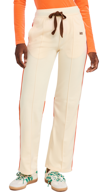 Wales Bonner Percussion Brand-embroidered Recycled-polyester Jogging Bottoms In Pale Yellow