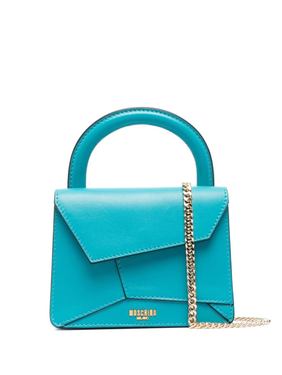 Moschino Asymmetrical Leather Mini Bag In Blau