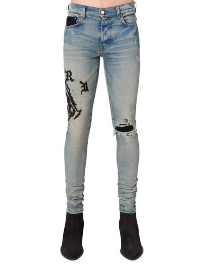 Amiri Wes Lang Skinny-fit Distressed Embroidered Jeans In Clay Indigo-12 oz It