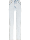 OFF-WHITE DIAGONAL STRIPED POCKET SKINNY JEANS