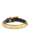 Valentino Garavani Garavani Rockstud Gold Leather Bracelet In Antique Brass/black