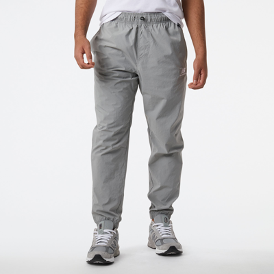 New Balance Men's Nb Athletics Higher Learning Wind Pant In Grey