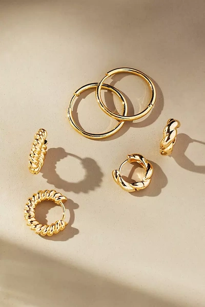 Anthropologie Set Of Three Twisted Metal Huggie Earrings In Gold