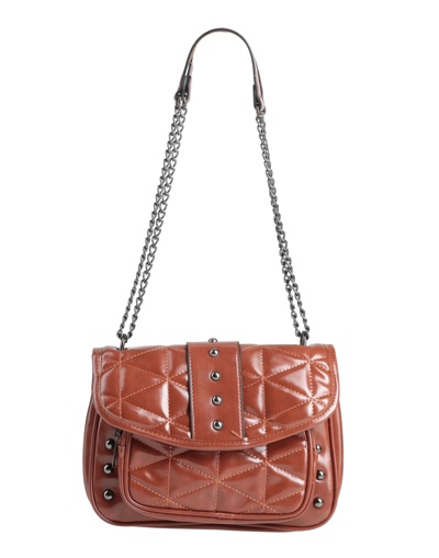 Rodier Handbags In Brown