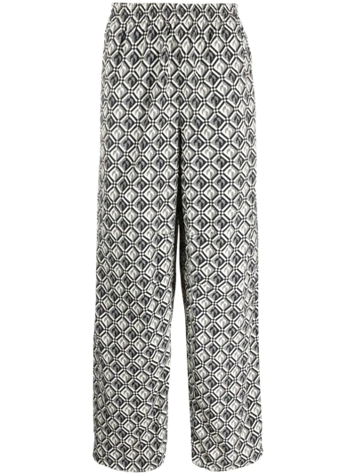 MARINE SERRE DIAMOND-PATTERN MOON TRACK PANTS