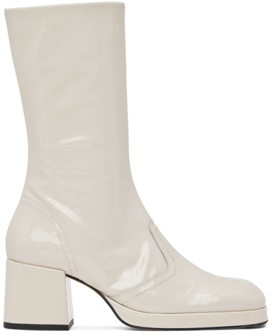 Miista Cass Patent Zip Boots In Beige
