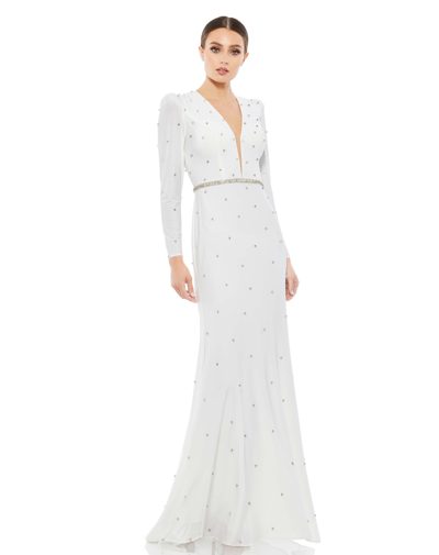 Ieena For Mac Duggal Belted Jewel Encrusted Plunge Neck Long Sleeve Gown In White