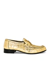 The Row Gathered Metallic Eel Leather Loafers In Gold