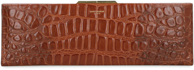 Saint Laurent Large Midnight Crocodile-embossed Clutch In Brown