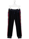 THE MARC JACOBS LOGO-TAPE VELOUR TRACK trousers
