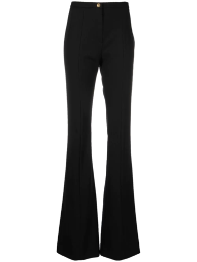 Patou Pleated Wool-blend Twill Flared Pants In Black