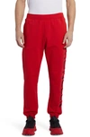 Moncler Embroidered Strike Out Cotton Sweatpants In Red