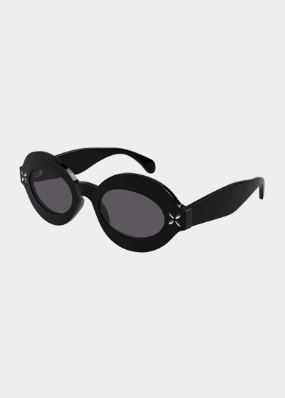 Alaïa Embellished Oval Acetate Sunglasses In Black