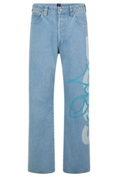 Hugo Boss Relaxed-fit Jeans With Graffiti Logos- Light Blue Men's Jeans Size 35/32