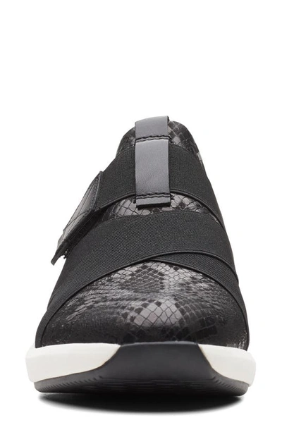 Clarks Un Rio Strap Sneaker In Black Snake Leather