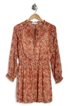 Socialite Smocked Long Sleeve Dress In Pink/ Rust Abstract Print