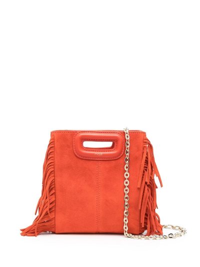 Maje Mini M Tassel-trimmed Suede Shoulder Bag In Jaunes / Oranges