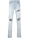 Amiri Distressed Slim-cut Jeans In Blau