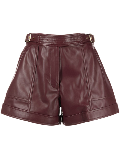 Jonathan Simkhai Buckled-waist Detail Faux Leather Shorts In Merlot