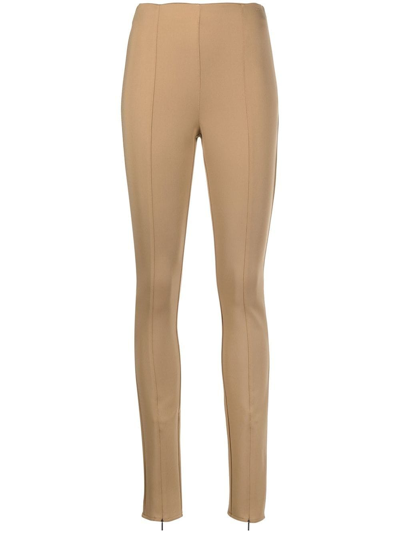Calvin Klein Logo-embroidered Cuff-zip Leggings In Brown
