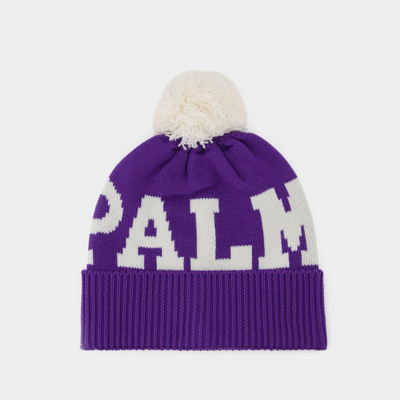 Palm Angels Logo Knitted Pompom Beanie In Purple