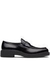 Prada Triangle Logo Chocolate Brushed Leather Loafers In Black