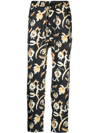 Nanushka Black Jain Floral Print Silk Track Pants In Black