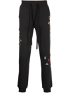 Haculla Decorative-pin Detail Track Pants In Black