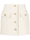 PUSHBUTTON BUTTON-UP MINI SKIRT