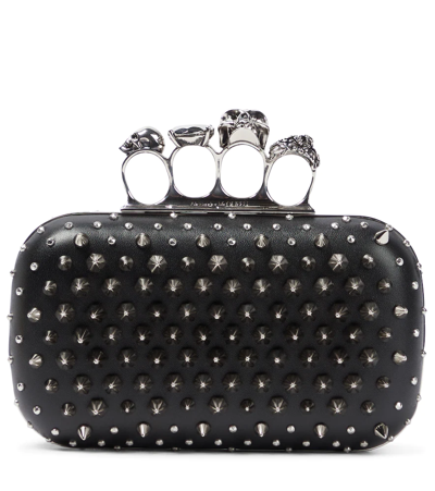 Alexander Mcqueen Four Ring Embellished Leather Clutch In Black
