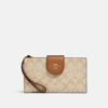 COACH OUTLET PHONE WALLET IN COLORBLOCK SIGNATURE CANVAS