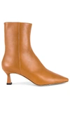 Lola Cruz High Heels Ankle Boots In Powder Leather In Cuero