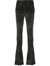 GENNY CROCODILE-EFFECT VELVET FLARED TROUSERS