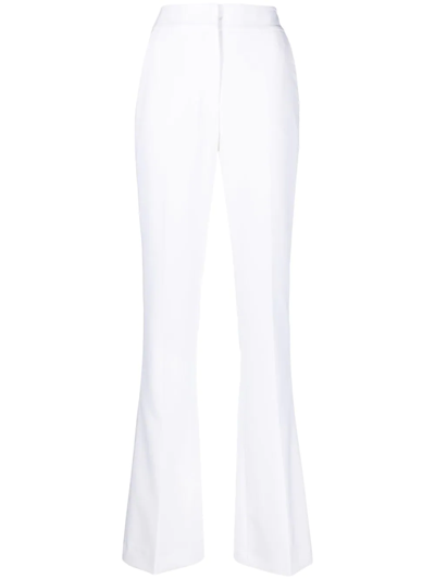GENNY HIGH-WAISTED FLARED TROUSERS