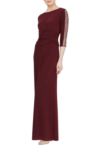 Sl Fashions Beaded Sleeve Ruched Gown In Burgundy