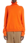 The Row Ciba Cashmere Turtleneck Sweater In Orange
