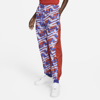 Nike Women's  Sportswear Icon Clash Woven Allover Print Pants In Red