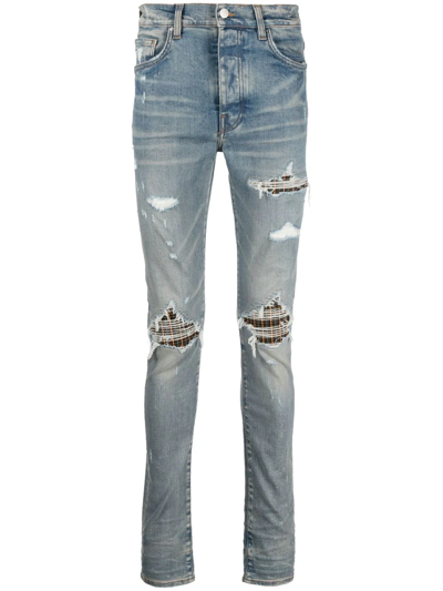 Amiri Mx1 Skinny-fit Leather-panelled Distressed Jeans In Clay Indigo