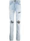 Amiri Distressed Slim-cut Jeans In Blue