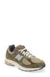 New Balance 2002r Sneaker In Dark Camo/ Rich Earth