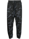 ALCHEMY CAMOUFLAGE-PRINT TAPERED TROUSERS