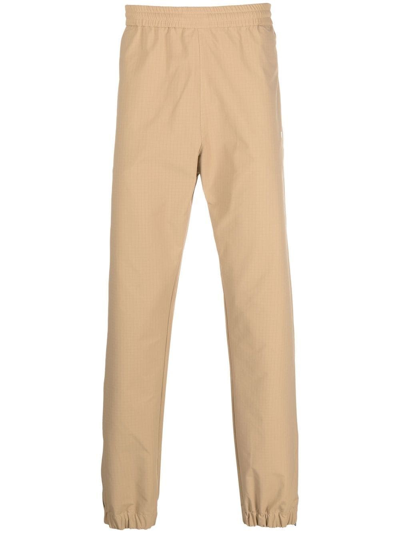 Msgm Logo-print Elasticated Waist Trousers In Nude & Neutrals