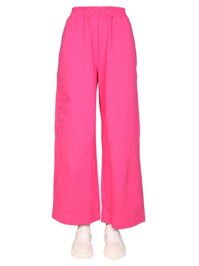 Mcq By Alexander Mcqueen Long Now Embossed Cotton-jersey Wide-leg Track Pants In Fuchsia