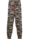 Roberto Cavalli Panther Print Track Pants In Black