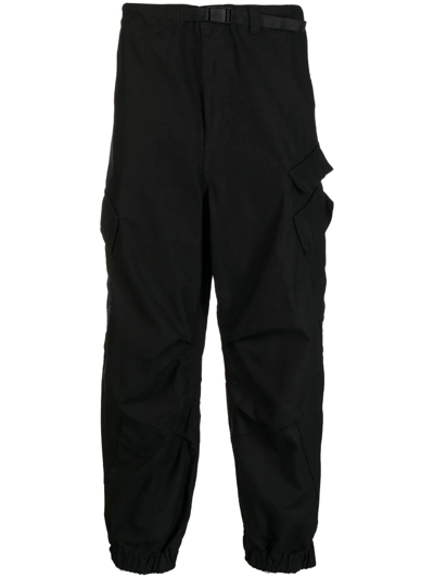 Undercover Raw-cut Tapered Cargo Trousers In Black