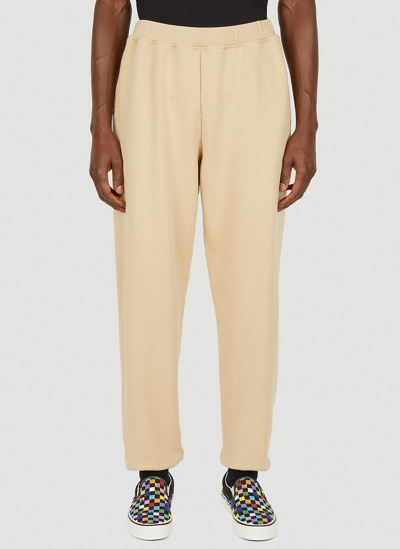 Aries Logo-print Cotton-jersey Track Pants In Beige