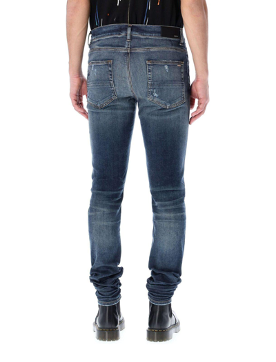 Amiri Slash Distressed Slim-fit Stretch-denim Jeans In Deep Classic Indigo